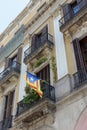 The flag of independent Catalonia hung in one of the windows of tenement houses in Barcelona Royalty Free Stock Photo